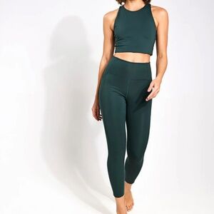 Girlfriend Collective 7/8 Leggings in Moss - women's size medium
